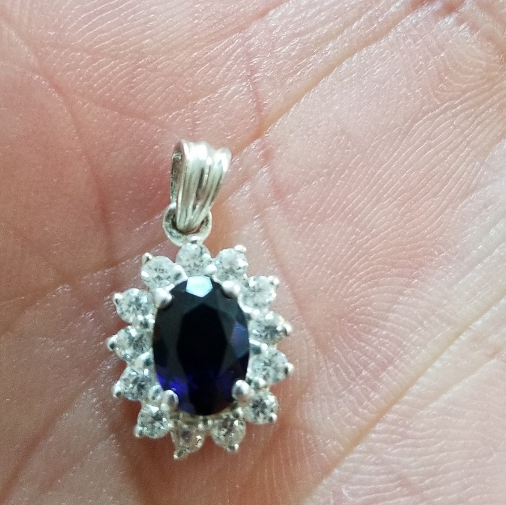 Blue sapphire with white sapphires pendant